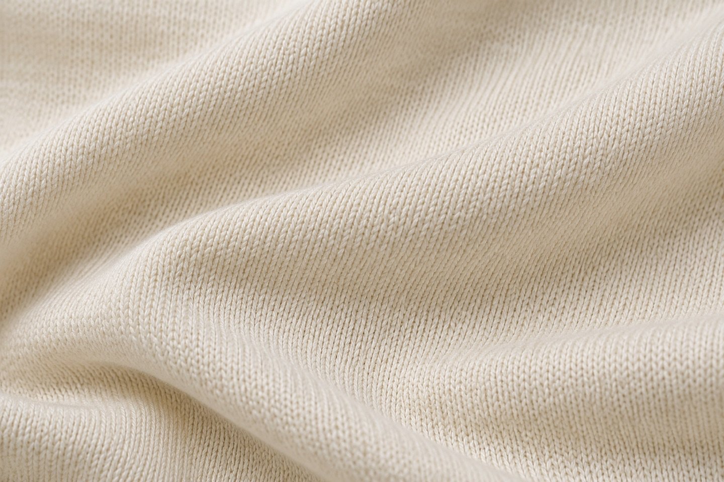 Ivory single jersey fabric with fine knit stitches