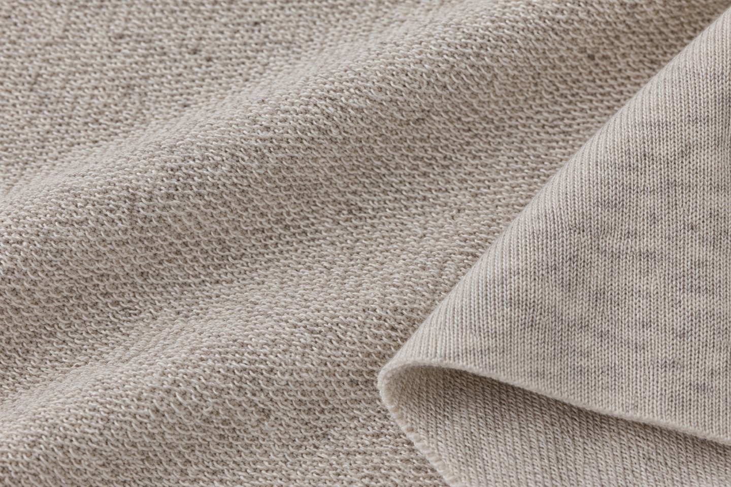 Oatmeal two-thread French terry with visible loop-back and smooth face